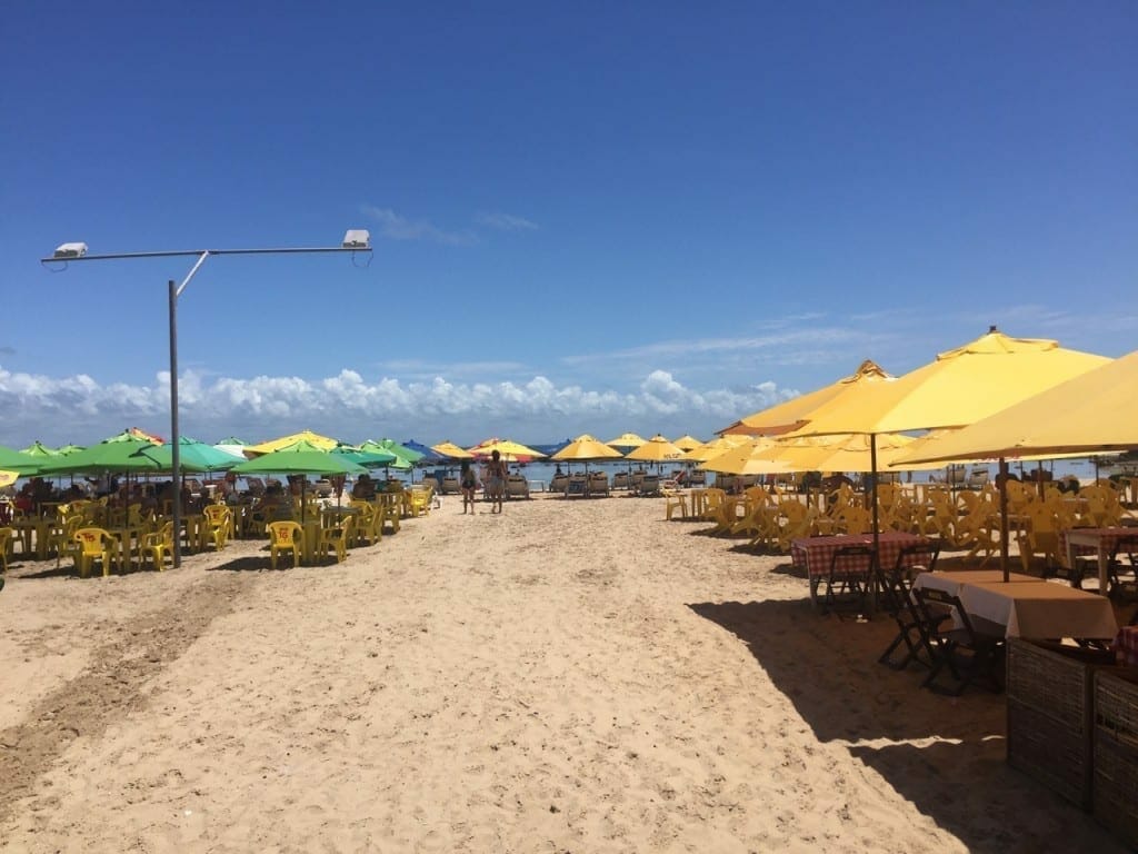 beach umbrellas, tables and chairs at the Second Beach, Morro de Sao Paulo, Bahia, Brazil