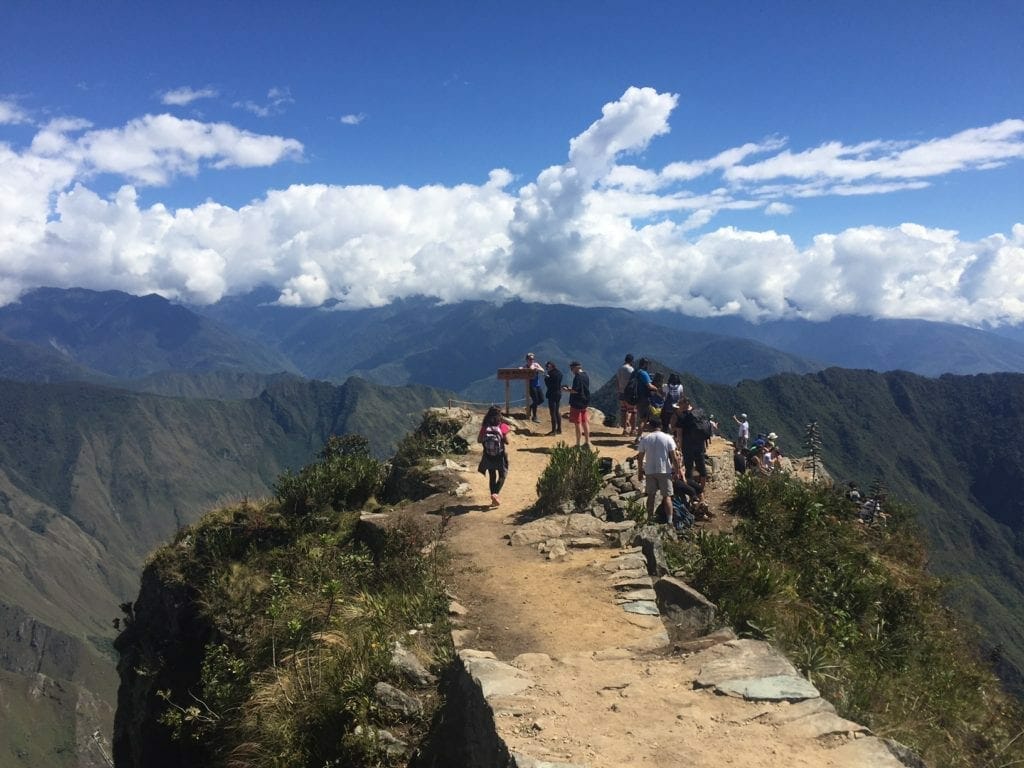 Some people at the summit of Machu Picchu Mountain