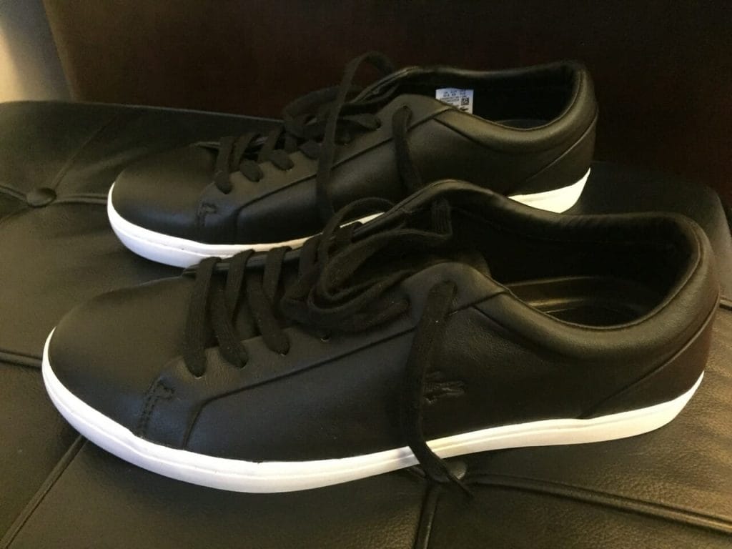 A pair of black leader sneaker 