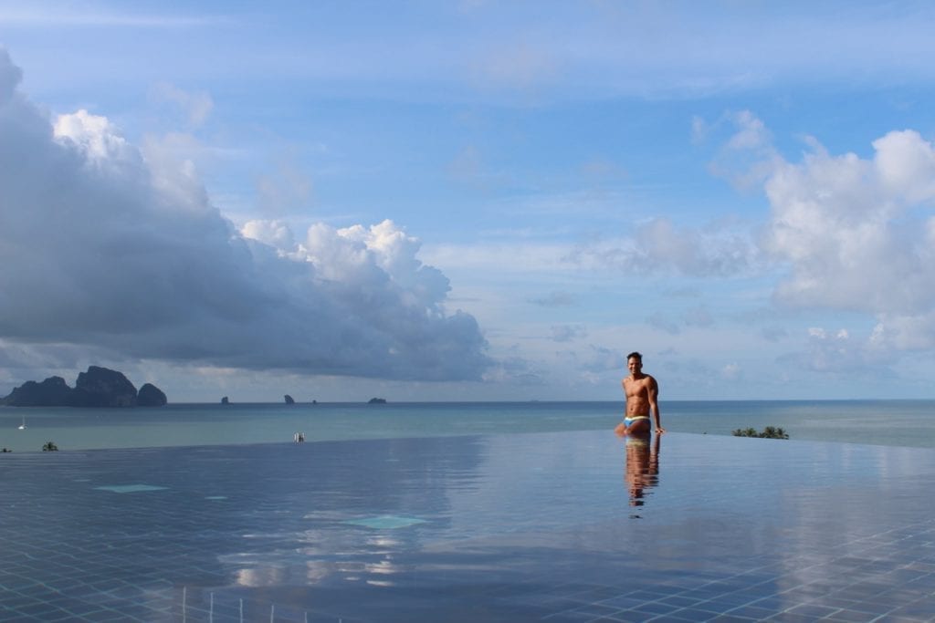 Pericles Rosa on the border of the infinity swimming pool at Avani Cliff Resort, Krabi, Thialand