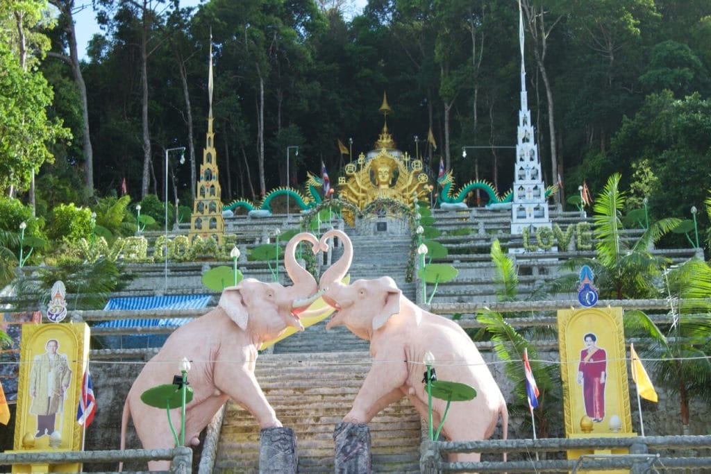 a big Buddhist temple on the top of a mountain, in the middle of the jungle in Ao Nang, Thailand