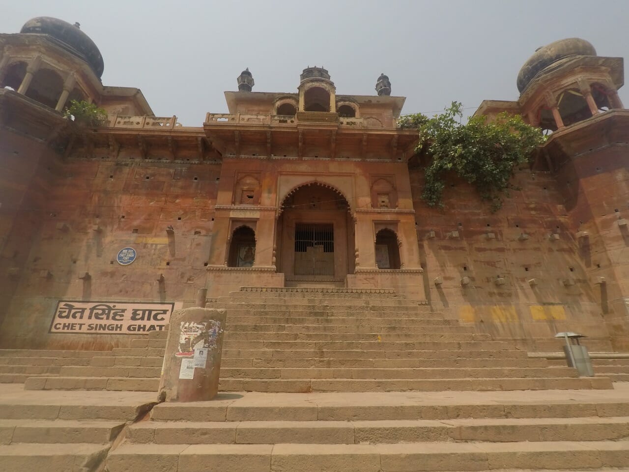 an old palace on the banks of the Ganges River in Varanasi, India