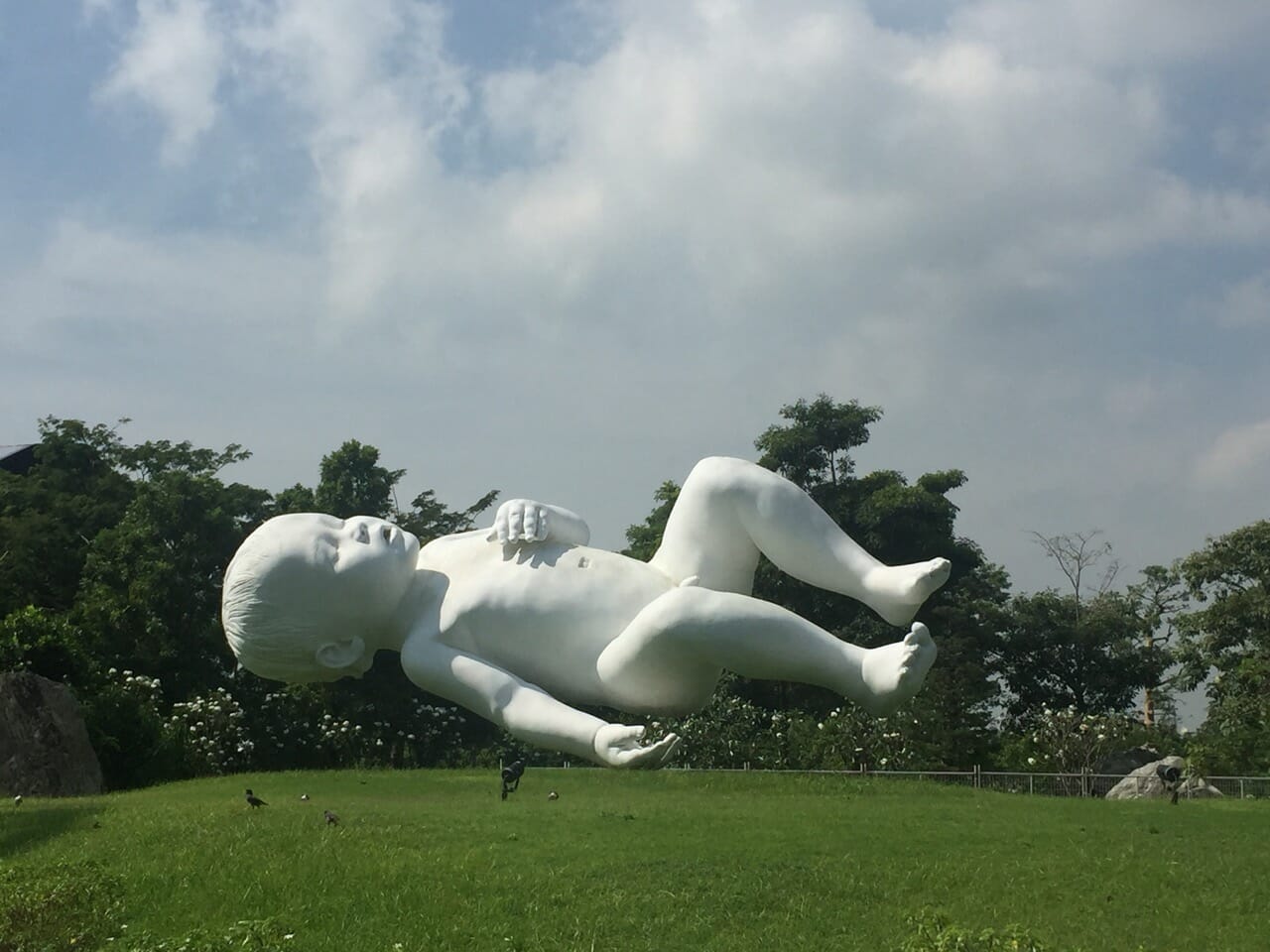 a massive white baby sculpture in Singapore