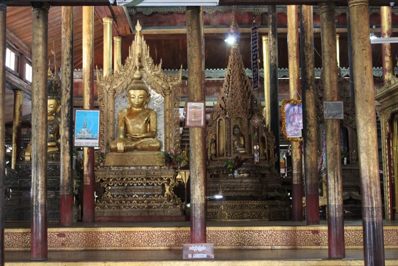 Some images of wood Buddhas and wood columns at Kyaun Khon Kyaung (Jumping Cat Monastery)