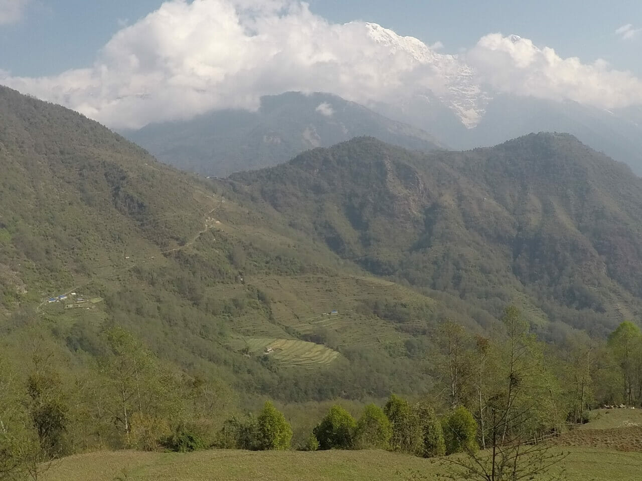 A village surrounded by huge mountains in Nepal