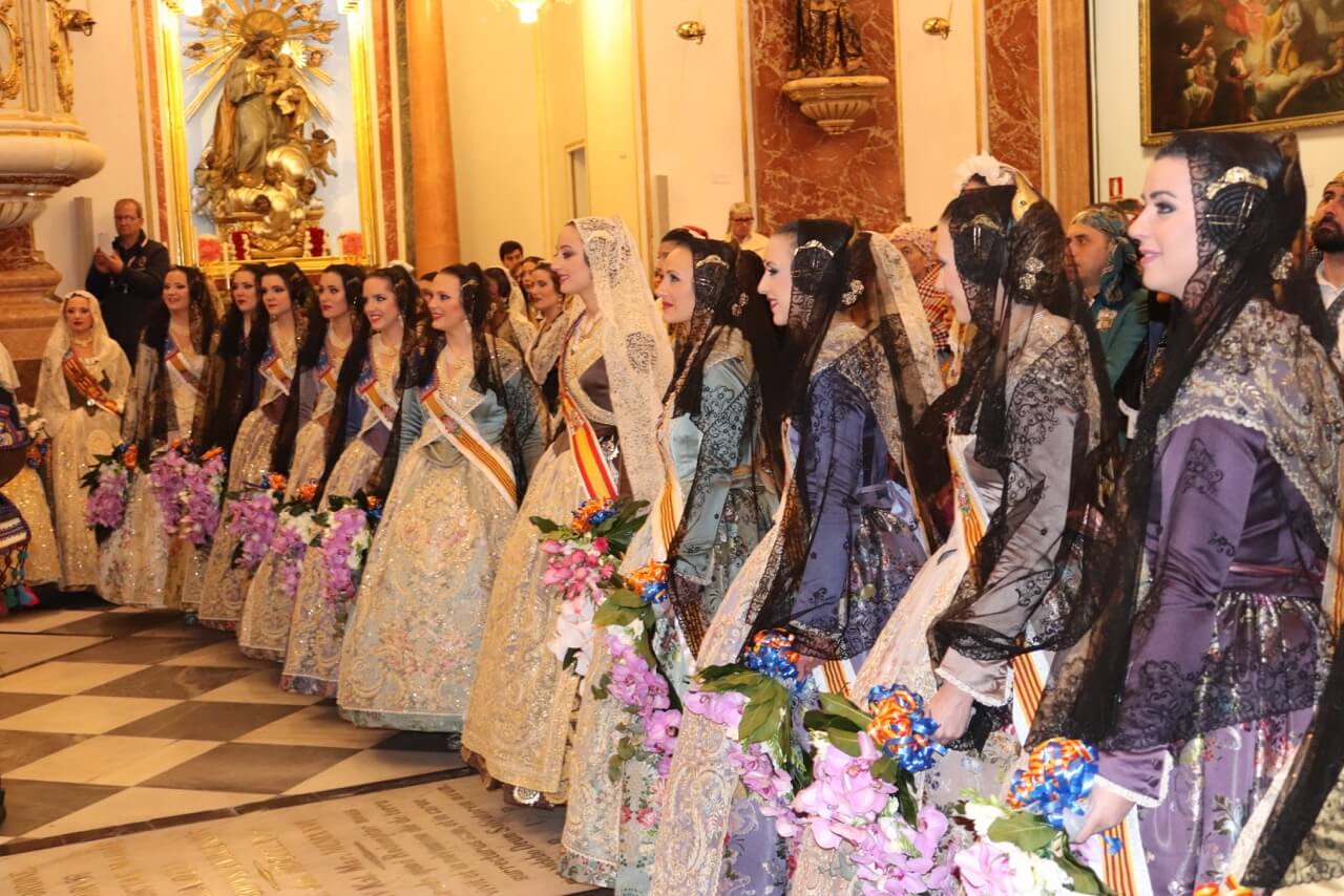 The fallera mayor of Valencia, in the center, and her court of honor at the Basilica of Our Lady of the Forsaken