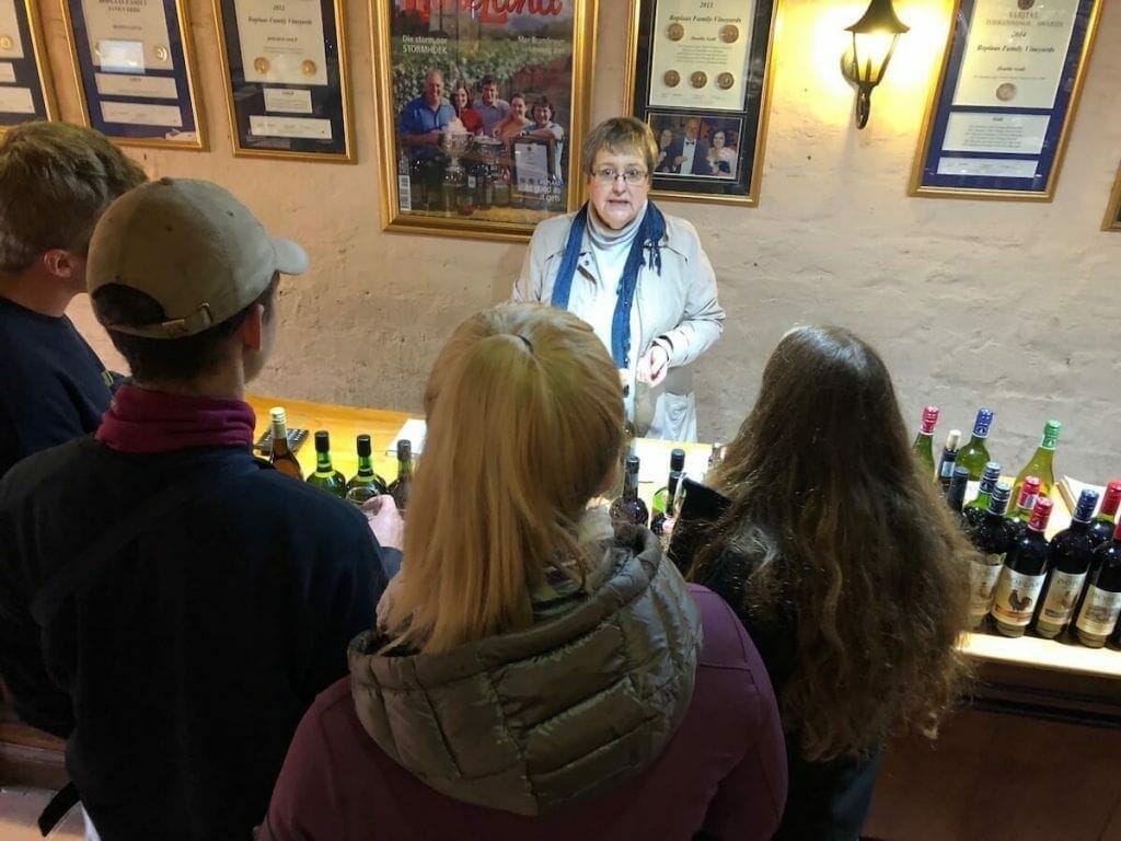 Some people doing a wine tasting at Boplaas, South Africa