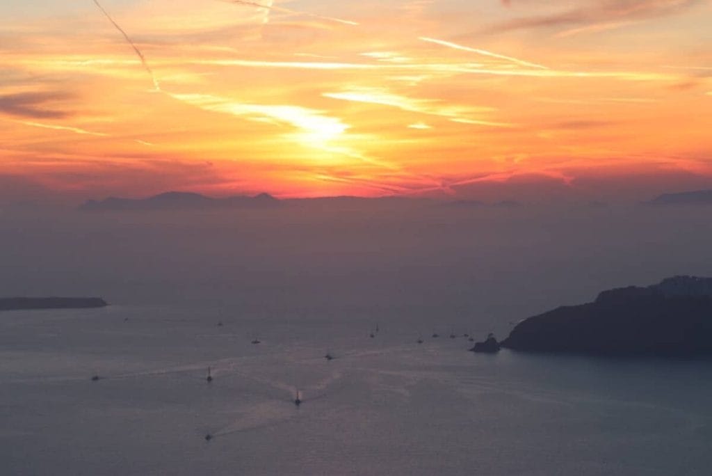 The sunset in the Aegean Sea in Santorini, Greece