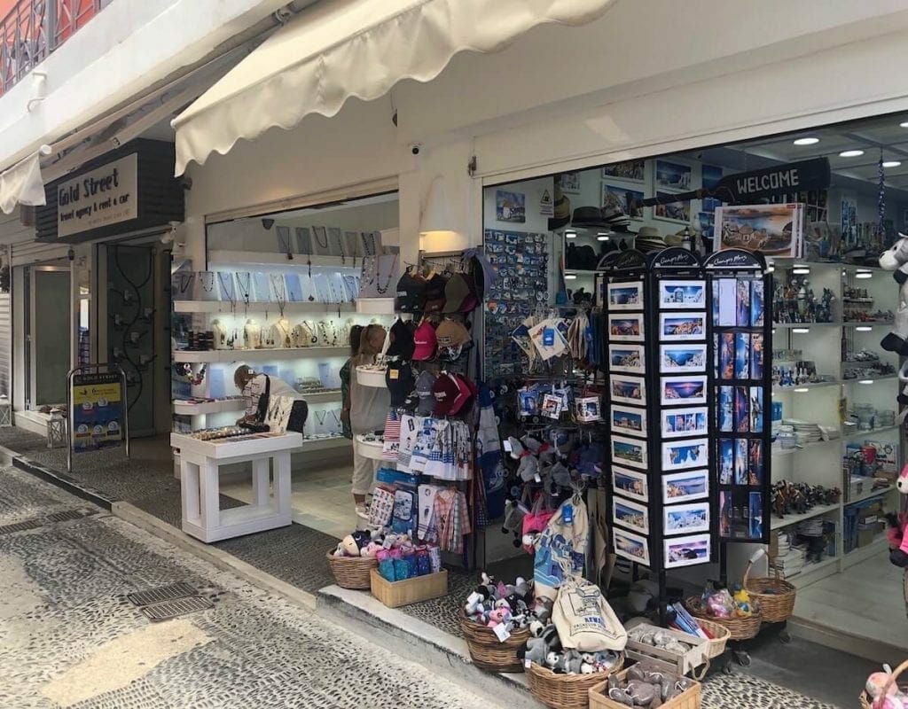 stores in Fira, the capital of Santorini, displaying Greek goods for tourists