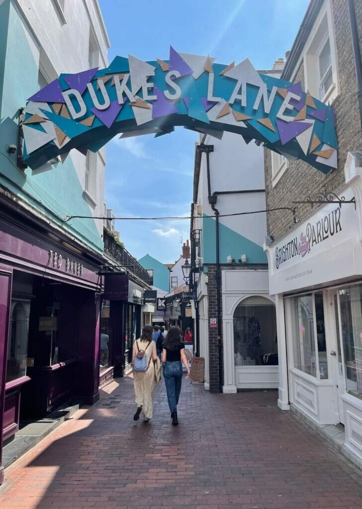 Two ladies walking on Dukes Lane, Brighton, England