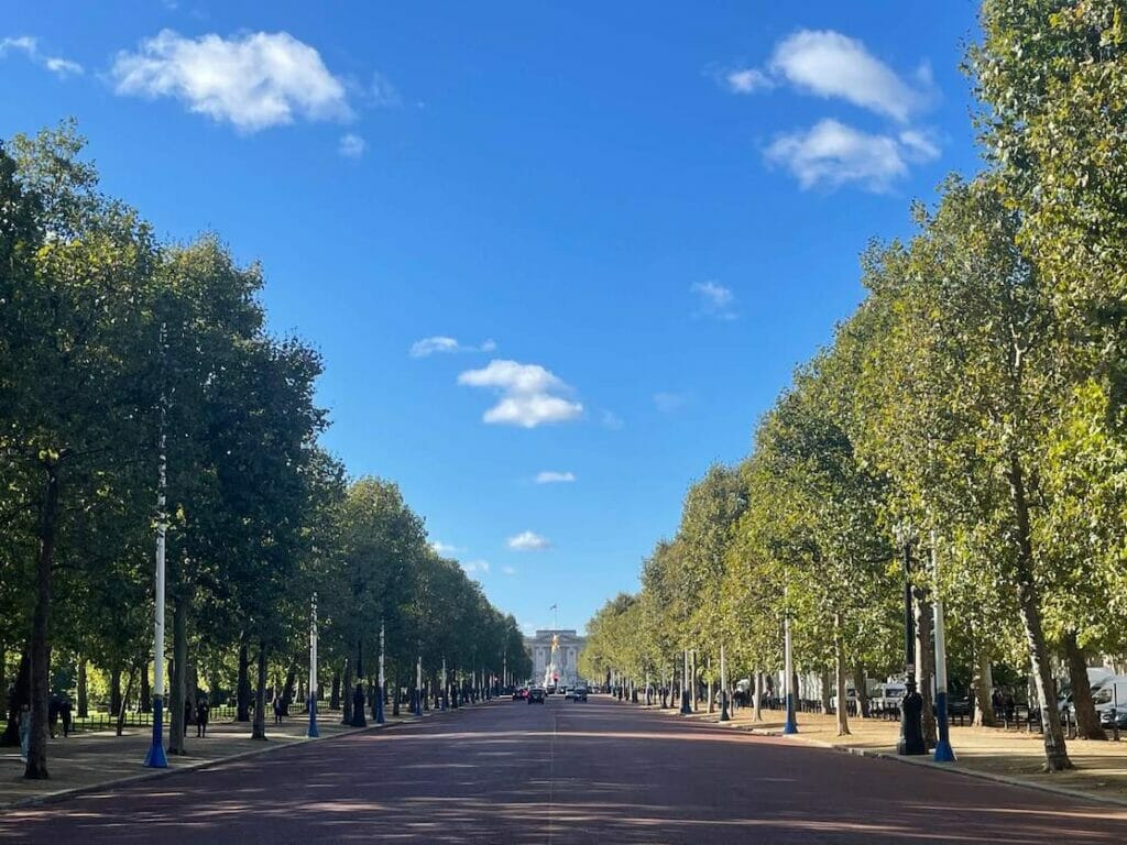 The Mall, a road bordered by lined trees in the City of Westminster, central London, between Buckingham Palace at its western end and Trafalgar Square via Admiralty Arch.