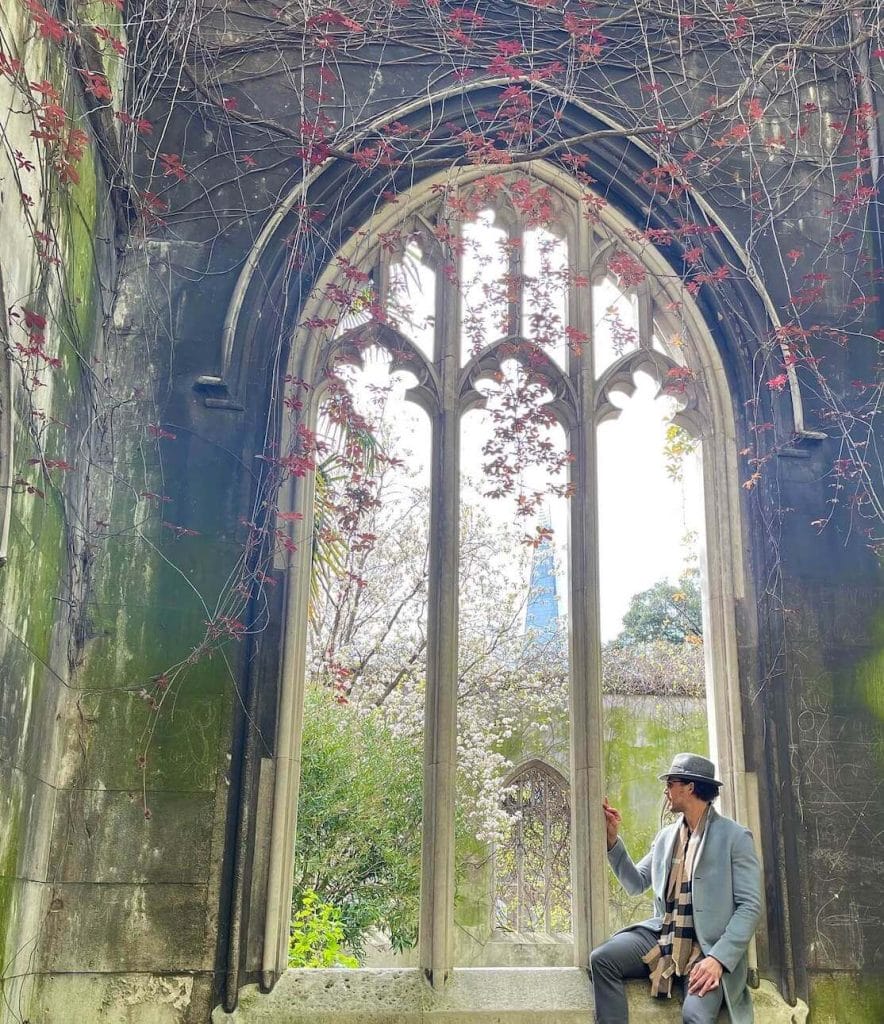 A man at St Dunstan in the East Church Garden, London