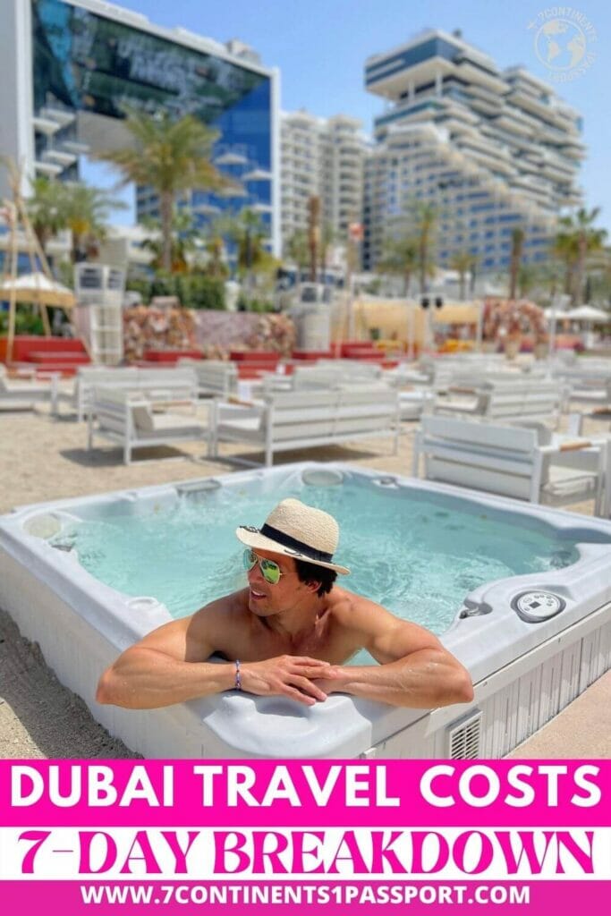 A man inside a jacuzzi at Beach by Five, West Palm Beach, Dubai, and the Five Palm Jumeirah Hotel in the background 