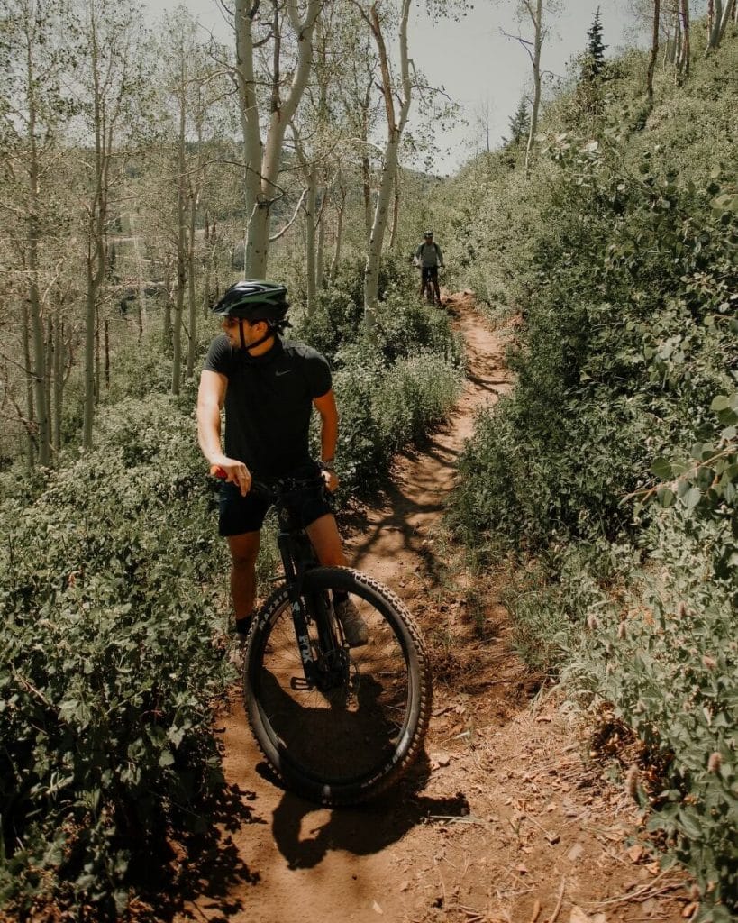 Two guys mountain biking in Park City, Utah, United States