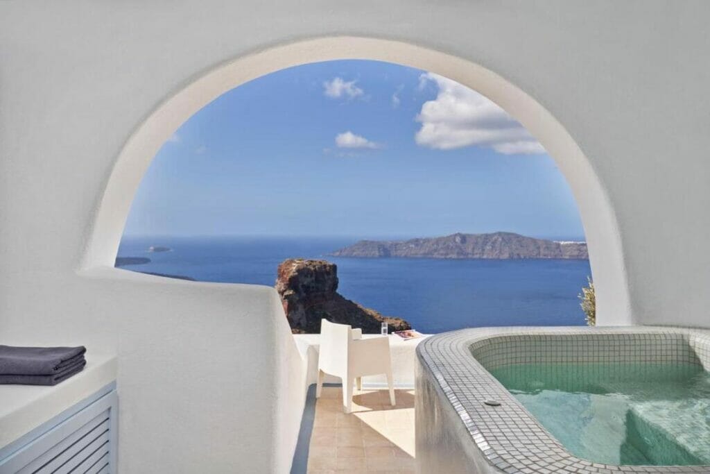 A double bed room with private pool and sea views at Astra Suites, Imerovigli, Santorini