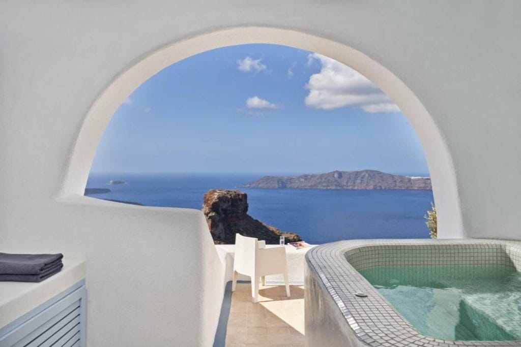 A double bed room with private pool and sea views at Astra Suites, Imerovigli, Santorini