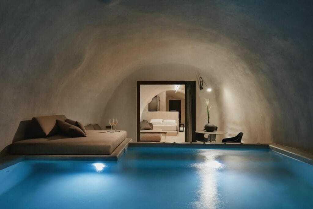 An Omni cave suite with private jacuzzi and a caldera view at Divine Cave Experience, Imerovigli, Santorini