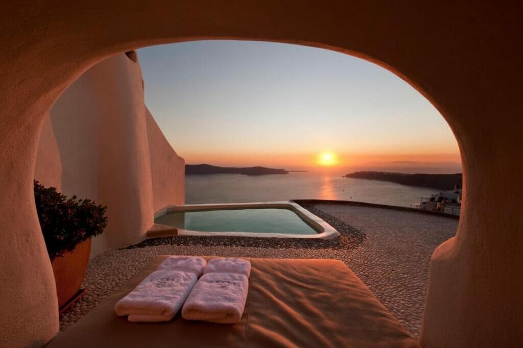 A suite with a plunge pool and sunset view at Kapari Natural Resort, Imerovigli, Santorini
