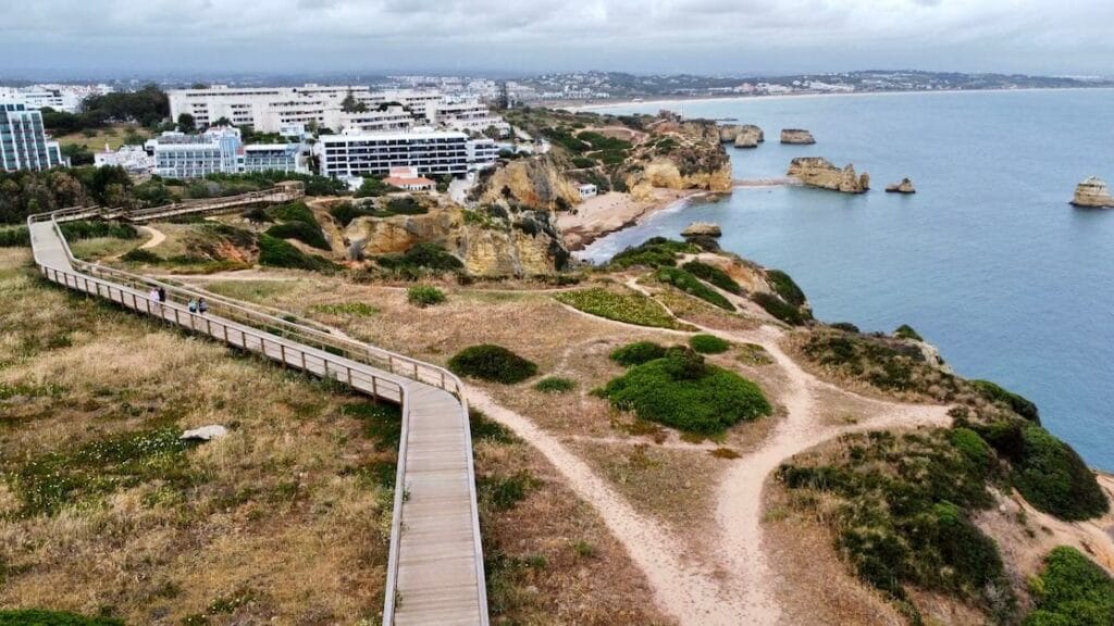 Aerial view over Ponta da Piedade Boardwalk from Praia da Dona Ana to Praia do Camilo, Lagos, Portugal