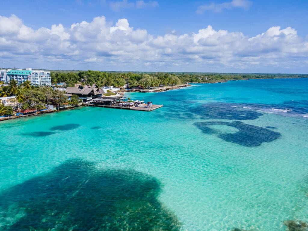 Beautiful aerial view of Boca Chica beach, its turquoise waters, resorts near the Santo Domingo Airport in Dominican Republic