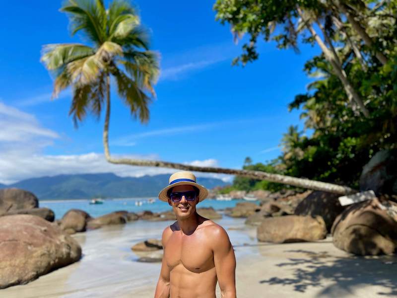 Pericles Rosa posing for a picture at Aventureiro Beach, Ilha Grande, Brazil